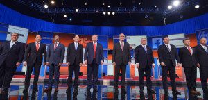 Republican presidential candidates arrive on stage for the Republican presidential debate on August 6, 2015 at the Quicken Loans Arena in Cleveland, Ohio. From left are:  New Jersey Gov. Chris Christie;  Florida Sen. Marco Rubio;  retired neurosurgeon Ben Carson; Wisconsin Gov. Scott Walker; real estate magnate Donald Trump; former Florida Gov. Jeb Bush; former Arkansas Gov. Mike Huckabee; Texas Sen. Ted Cruz; Kentucky Sen. Rand Paul; and Ohio Gov. John Kasich.  AFP PHOTO / MANDEL NGAN        (Photo credit should read MANDEL NGAN/AFP/Getty Images)