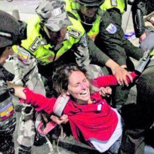 Photo of Manuela Picq being arrested. Photo used with permission. 